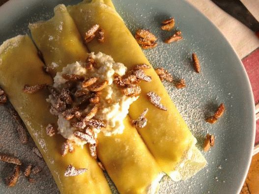 Frittelle con ricotta al limone e mandorle candite