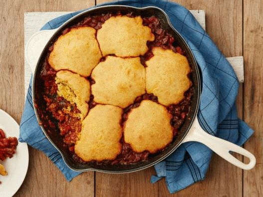 Foto del Cile in padella con pane di mais