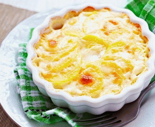 Foto gratin di patate con zucca e petto affumicato