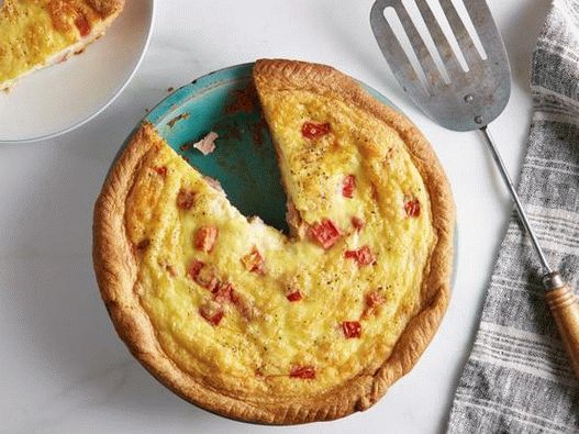 Foto di quiche con prosciutto, pomodoro e formaggio