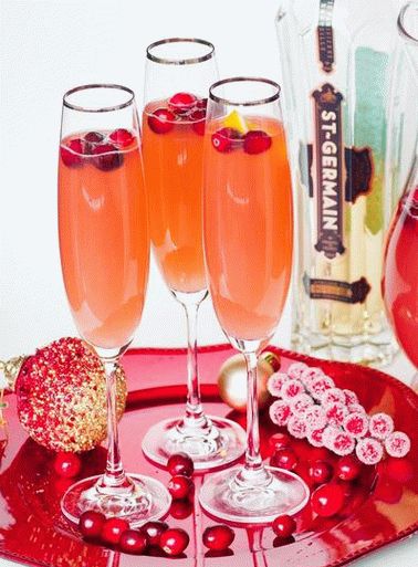 Photo Cocktail con champagne e mirtilli rossi