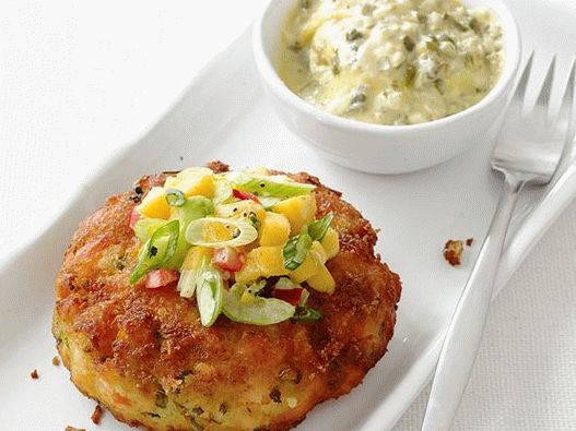 Foto Cotolette di salmone con insalata di mango al curry