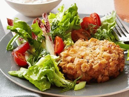 Costolette di granchio con insalata verde