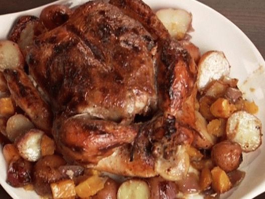 Foto di pollo con Garam Masala e verdure al forno