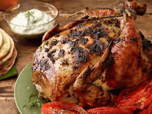 Foto di pollo con verdure e pomodori al forno