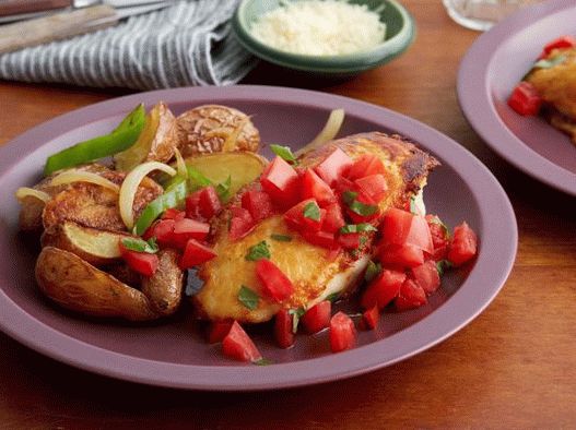 Foto di petti di pollo con parmigiano e patate al forno