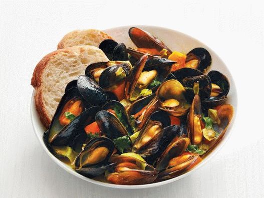 Foto di cozze con zucca di noce moscata al curry