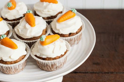 Foto di muffin carota-zucca con glassa alla vaniglia