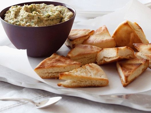 Foto di purea di fagioli bianchi con patatine fritte