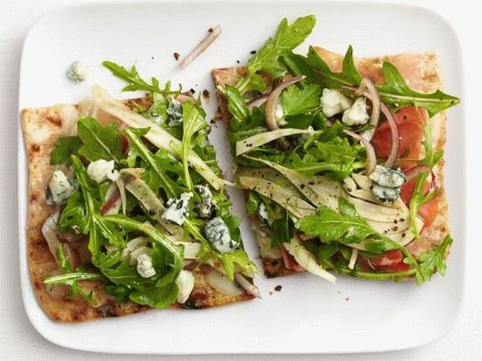 Foto del piatto - Pizza su pane pita con prosciutto e rucola