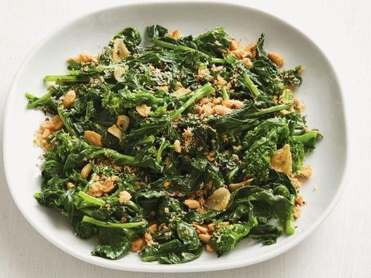 Rapini fritti con cocco e arachidi