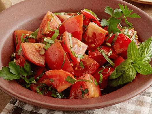 Foto Insalata di pomodori marinati alle erbe