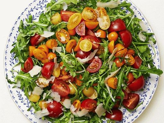 Foto Insalata di rucola con pomodori