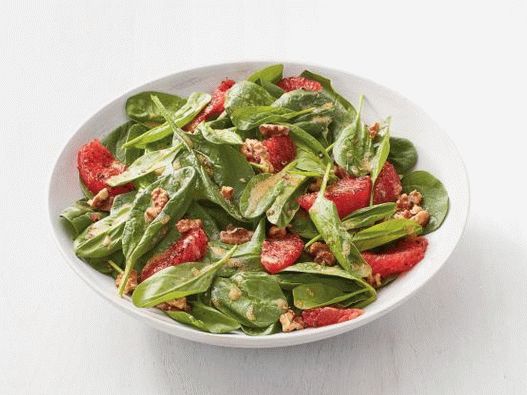 Insalata di foto con spinaci e pompelmo fritto