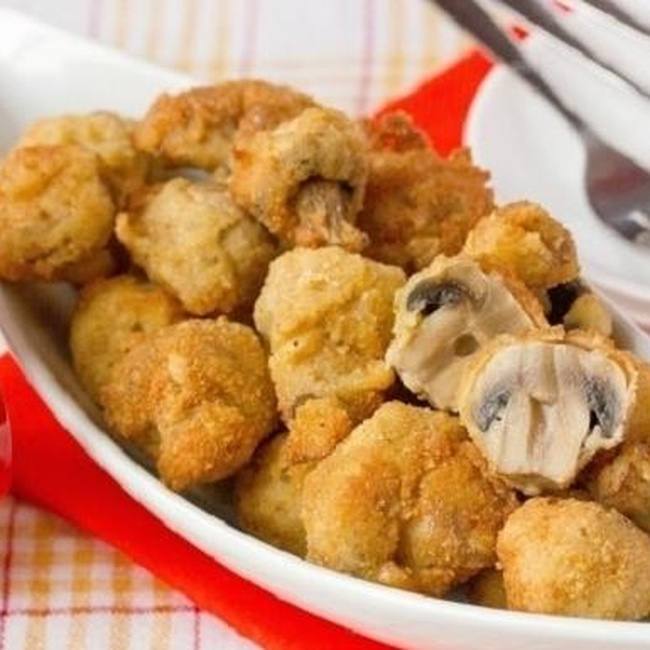 Champignon fritti nel grasso bollente