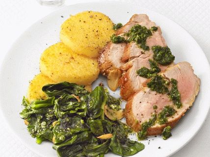 Foto di maiale al forno con polenta e pesto