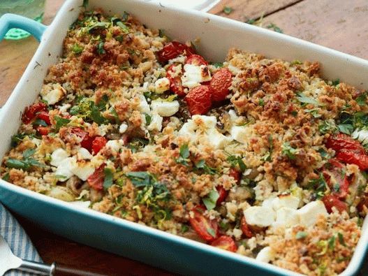 Foto Melanzane al forno con pomodori e shtrezelom