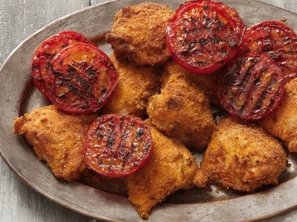 Foto di cosce di pollo alla griglia nel pangrattato